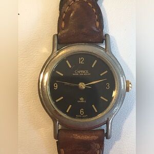 3/$40 Caprice vintage leather band watch